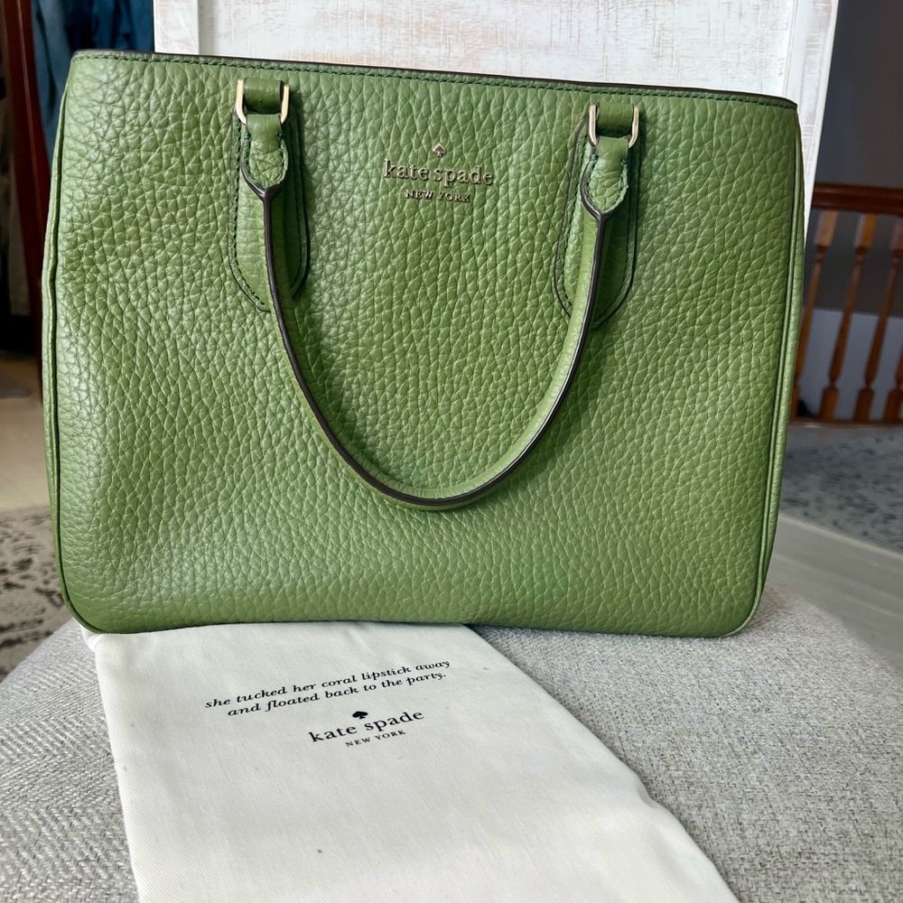 Kate spade mid size handbag. No shoulder strap. Does have dust bag included.